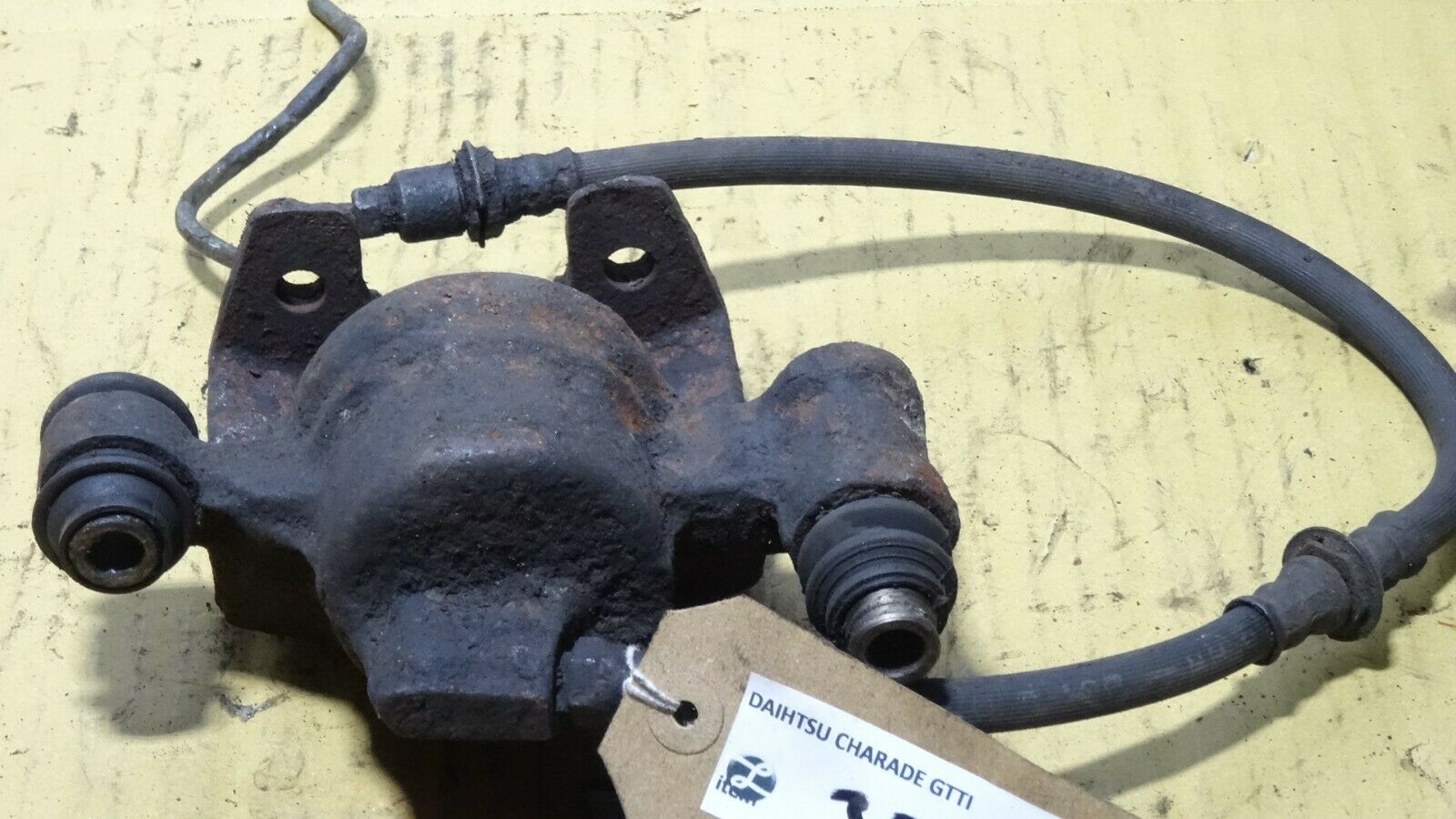 DAIHATSU CHARADE GTti cb80 TURBO FRONT BRAKE CALIPER NSF PASSENGER SIDE LEFT